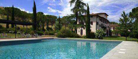 2 outdoor pools, open 9 AM to 7 PM, pool loungers