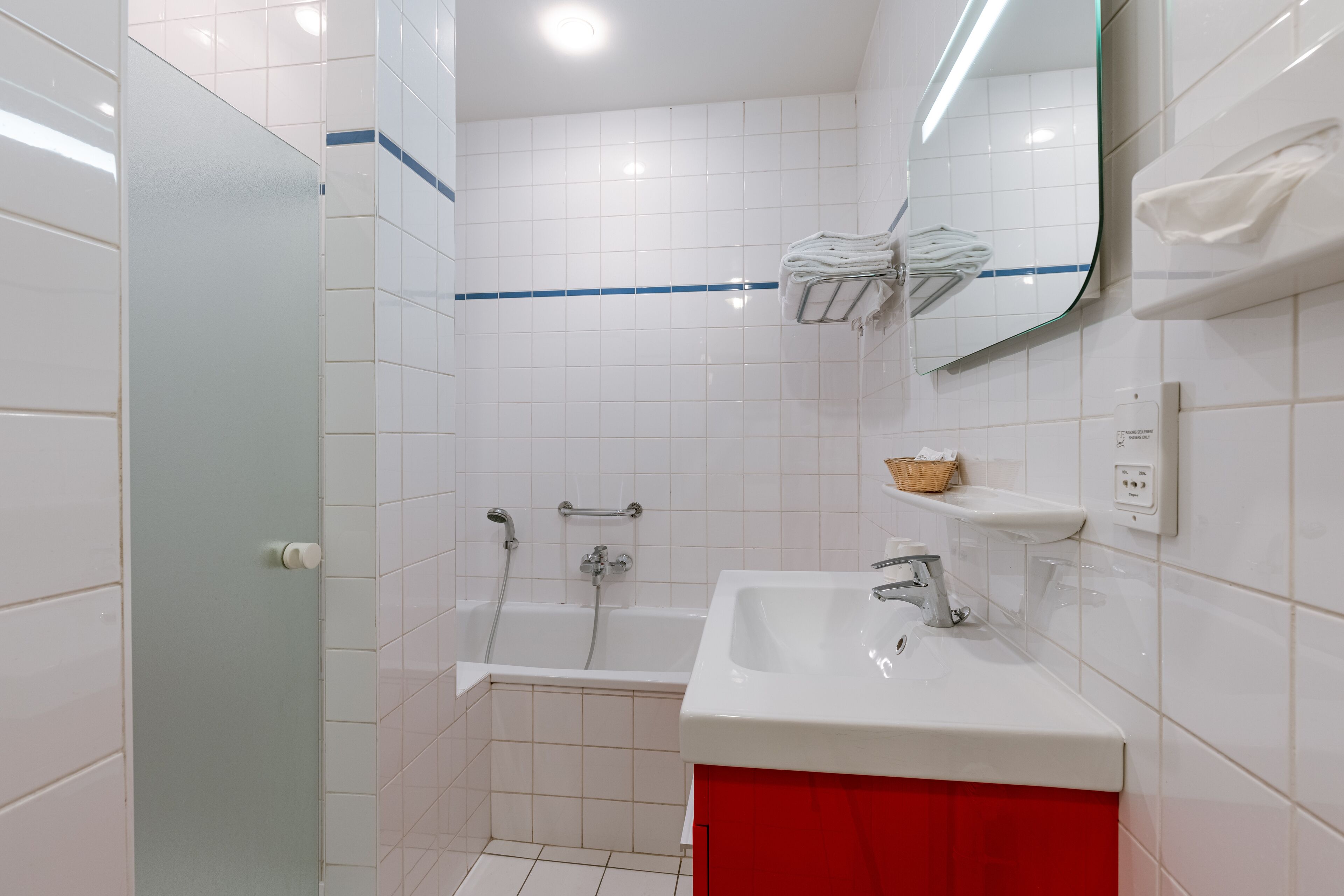 family suite | bathroom | separate bathtub and shower, free toiletries, hair dryer, towels