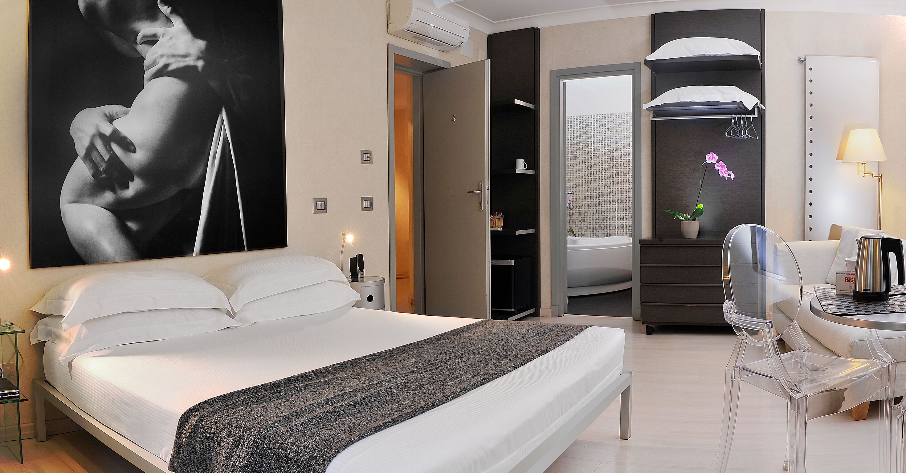 Premium bedding, memory foam beds, free minibar, in-room safe