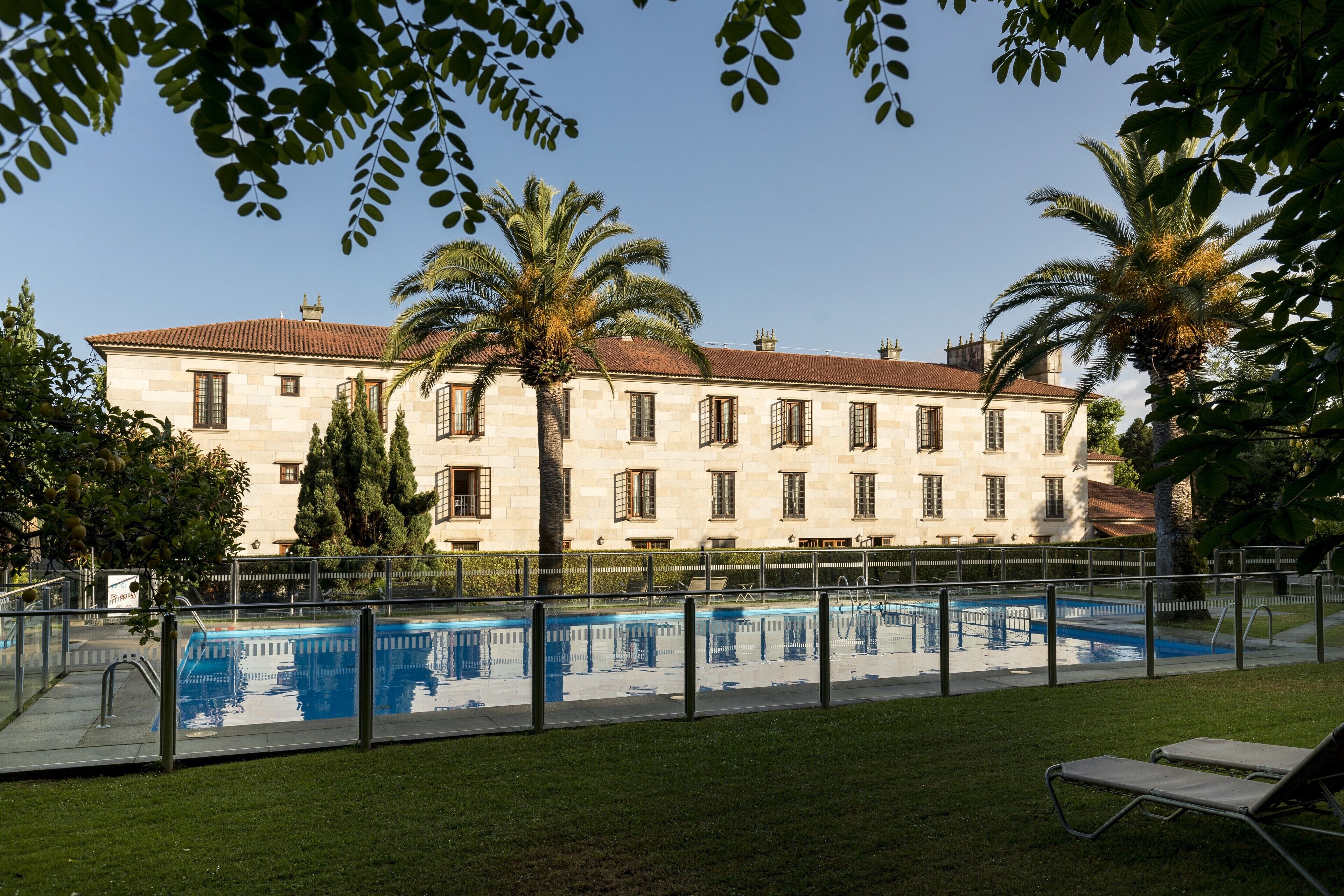 outdoor pool, pool umbrellas, pool loungers