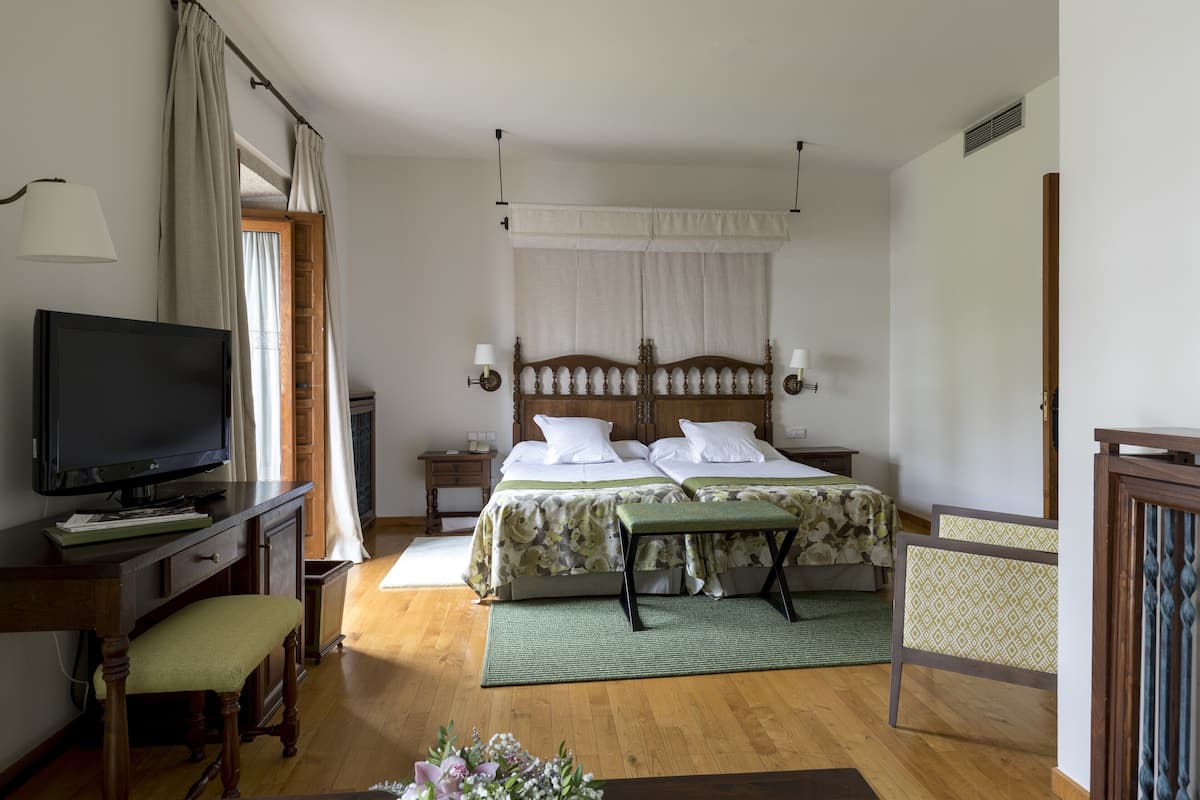 Superior Double Room, 1 Bedroom | Minibar, in-room safe, desk, free WiFi