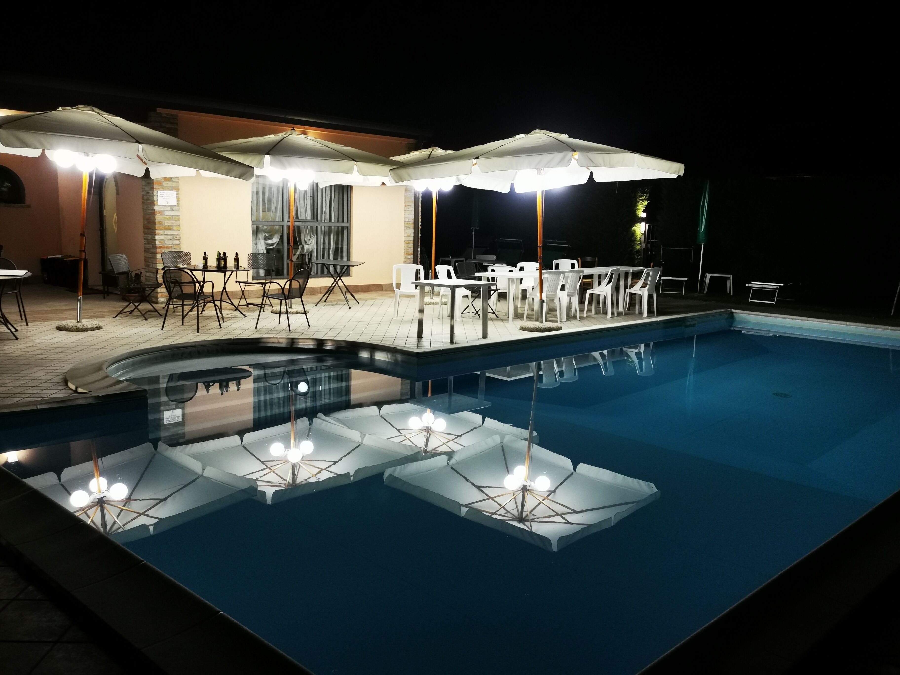 Outdoor pool, pool umbrellas, pool loungers