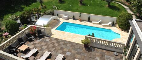 Seasonal outdoor pool, open 8:00 AM to 8:00 PM, free pool cabanas