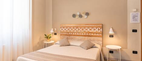 Double Room | Minibar, desk, iron/ironing board, free cribs/infant beds