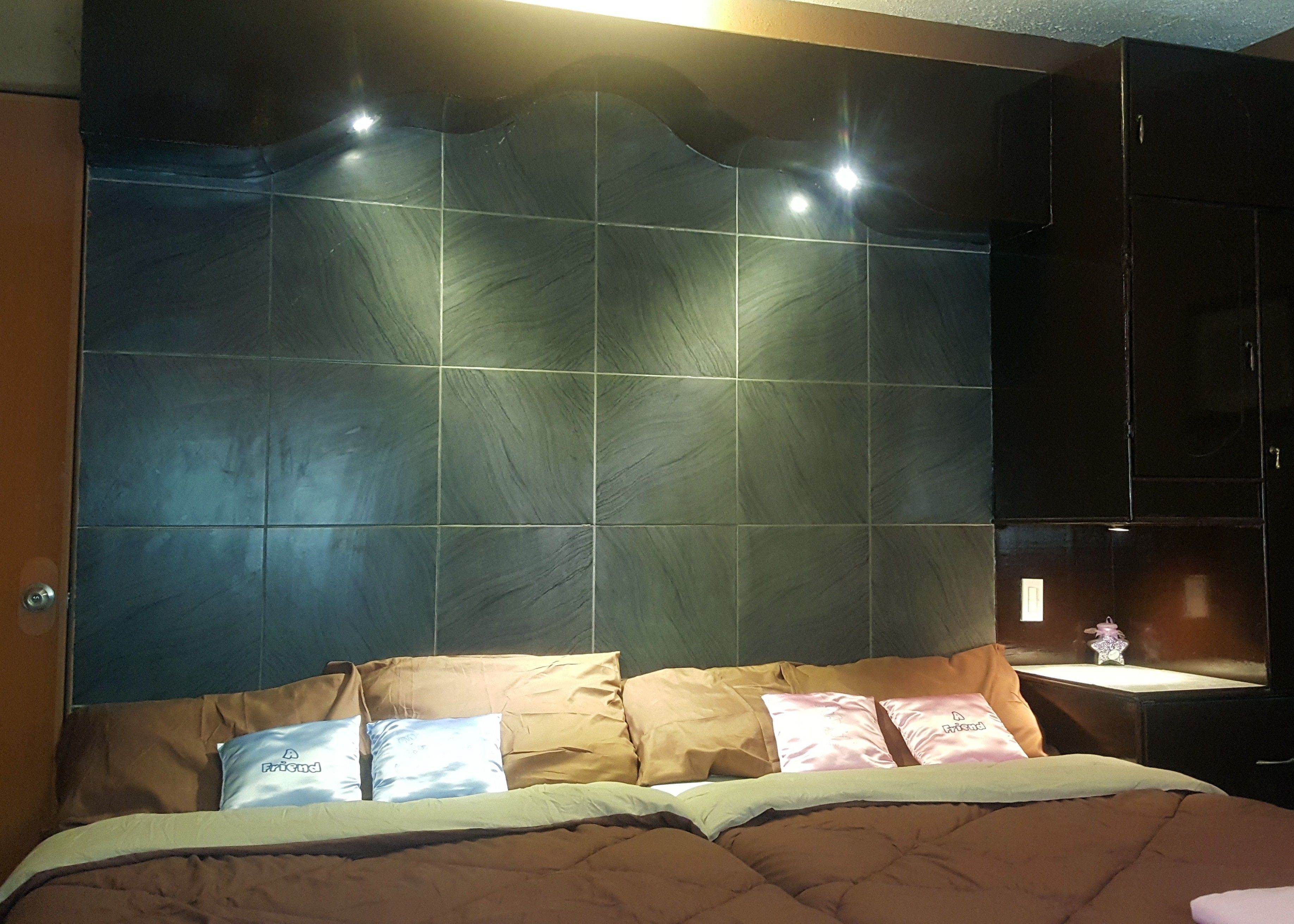 deluxe double room, 2 bedrooms, smoking, partial ocean view | premium bedding, memory-foam beds, in-room safe, individually decorated