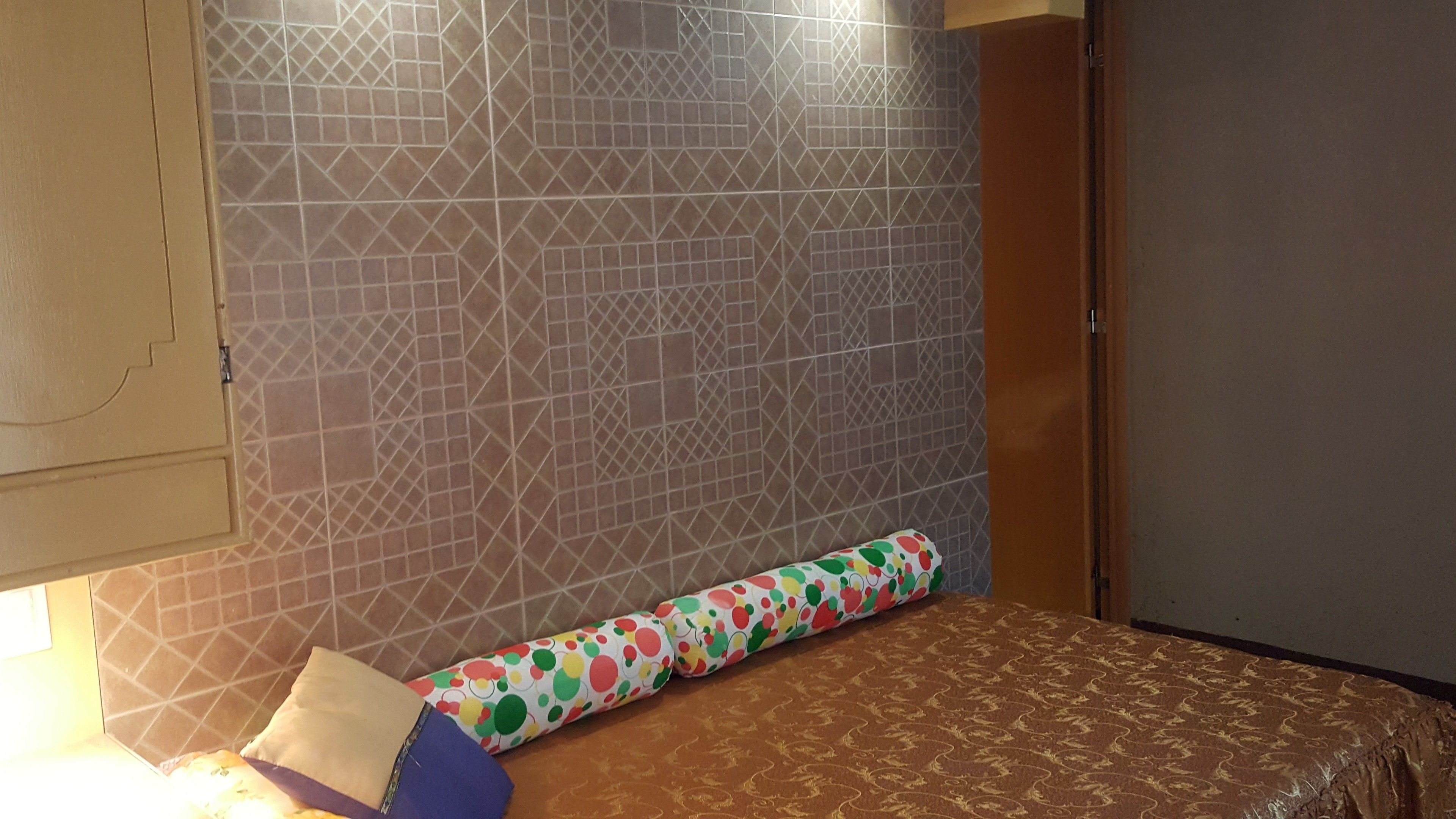 deluxe double room, 2 bedrooms, smoking, partial ocean view | living room | led tv, first-run films