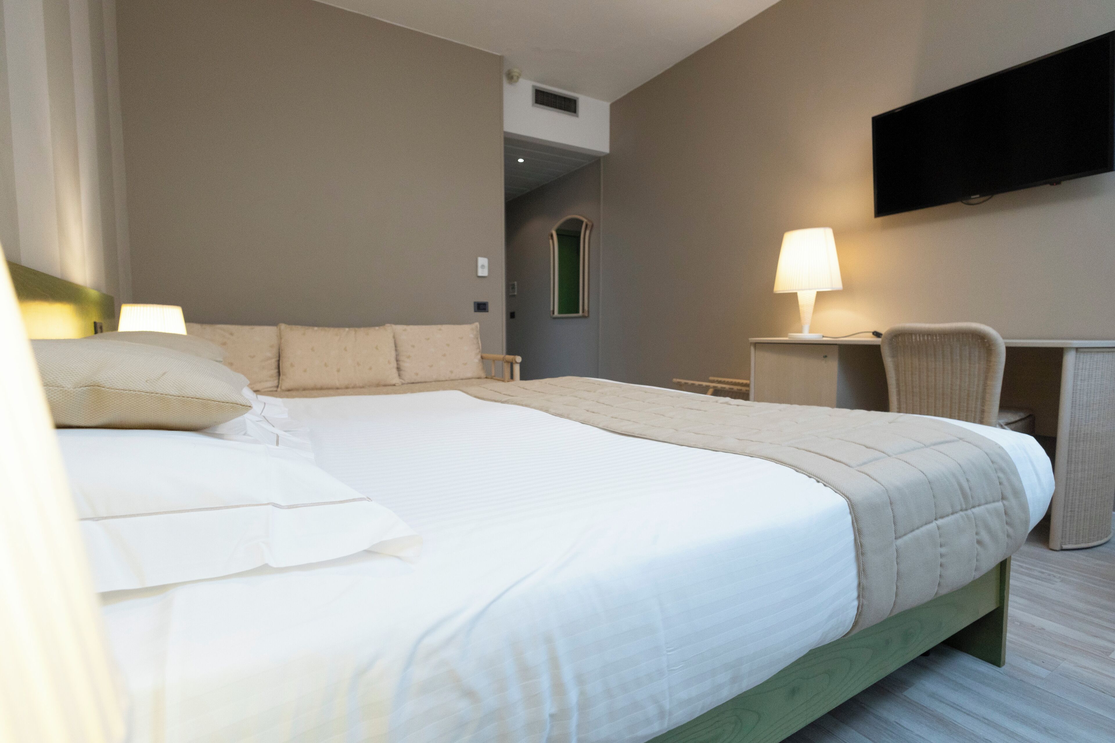 quadruple room | hypo-allergenic bedding, down duvets, in-room safe, desk