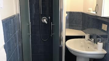 Double Room, 1 Queen Bed | Bathroom | Shower, hair dryer, towels, soap