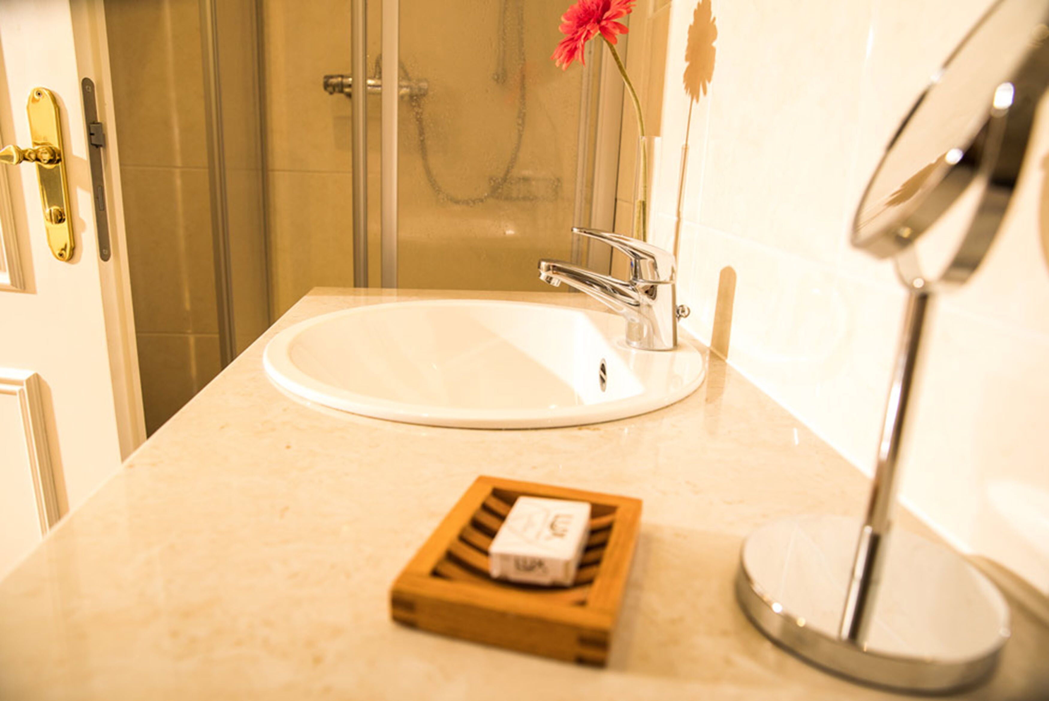 single room | bathroom | hair dryer, towels