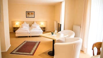 Double Room | Living area | 32-inch TV with cable channels