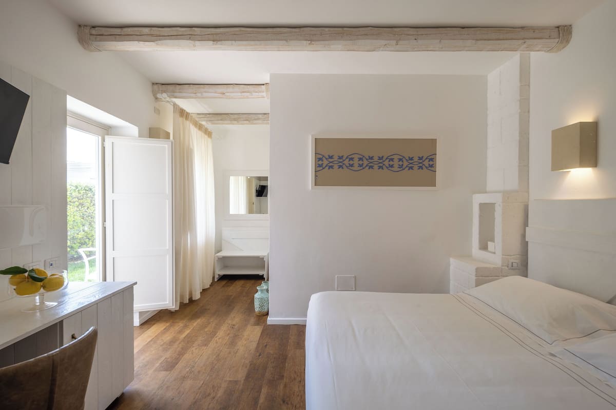 Design-Zimmer, Erdgeschoss | Minibar, Zimmersafe, individuell dekoriert, individuell eingerichtet