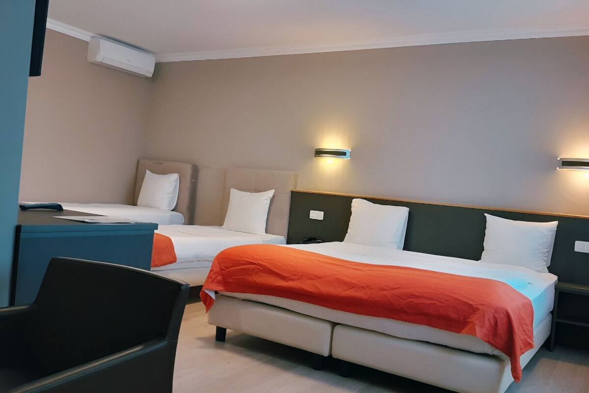 standard quadruple room, multiple beds, non smoking | 1 bedroom, in-room safe, desk, laptop workspace