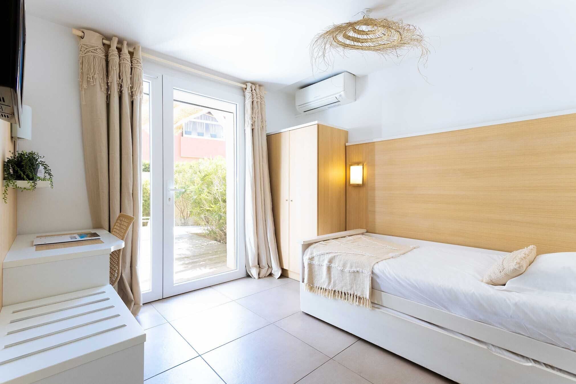 junior quadruple room, 2 bedrooms, accessible, terrace | in-room safe, desk, blackout curtains, soundproofing