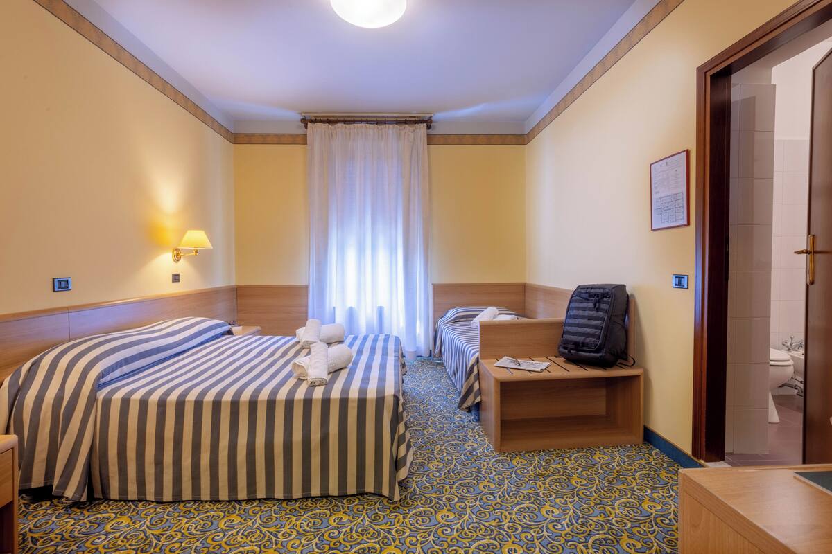 triple room | down duvets, in-room safe, desk, laptop workspace