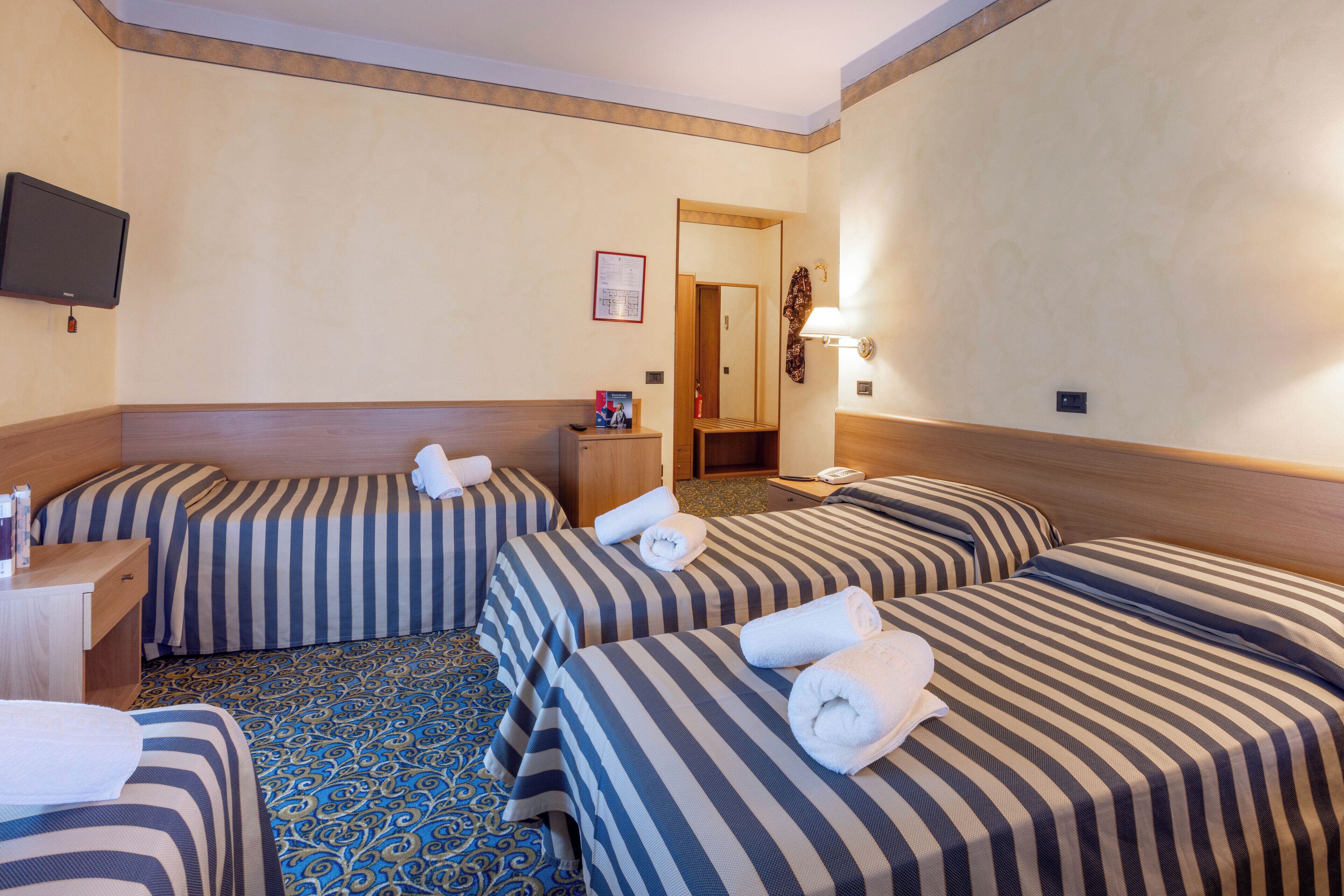 quadruple room | down duvets, in-room safe, desk, laptop workspace