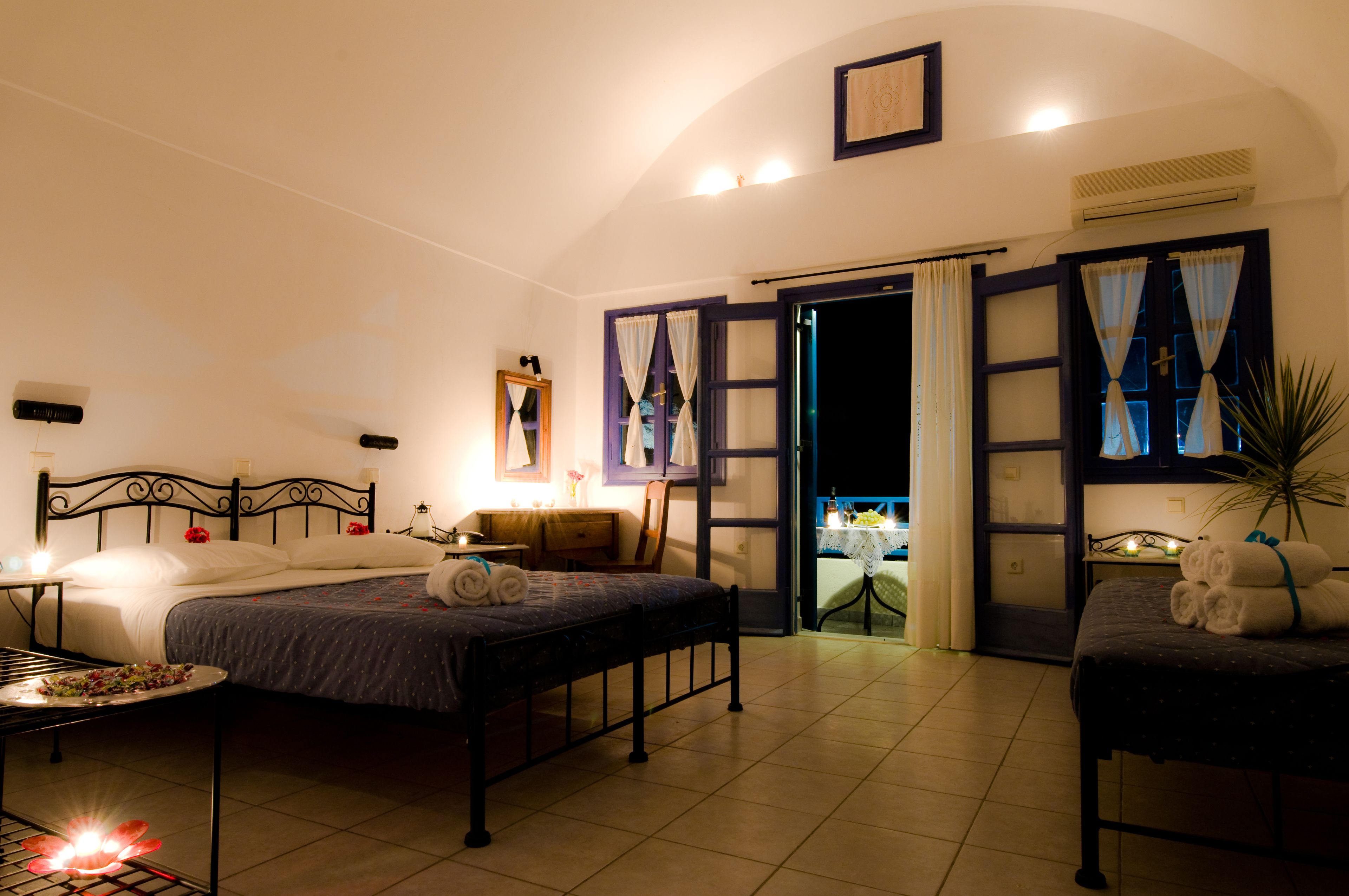 Standard Triple Room | Minibar, in-room safe, desk, iron/ironing board