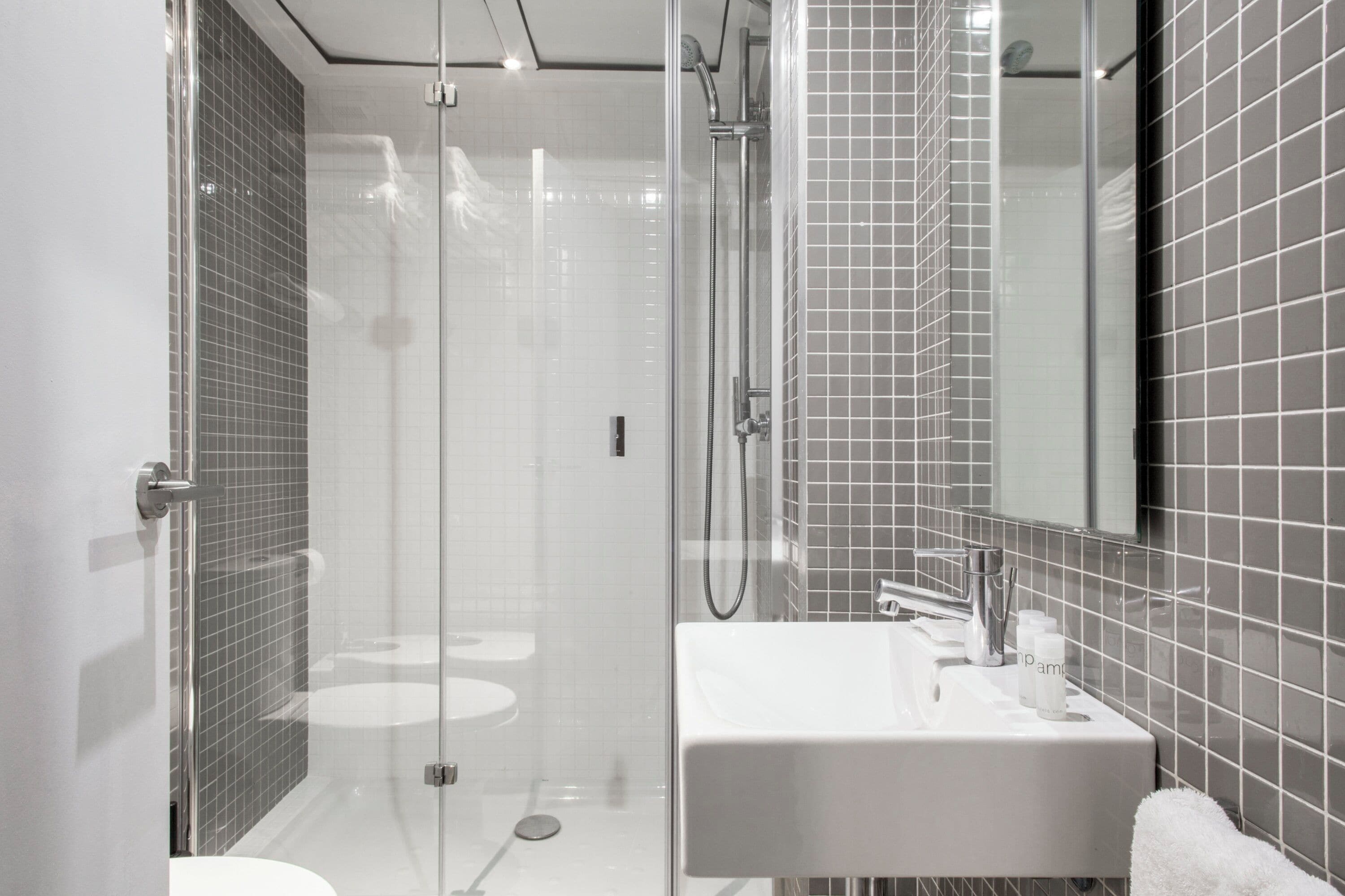 Executive Apartment | Bathroom | Hair dryer, towels