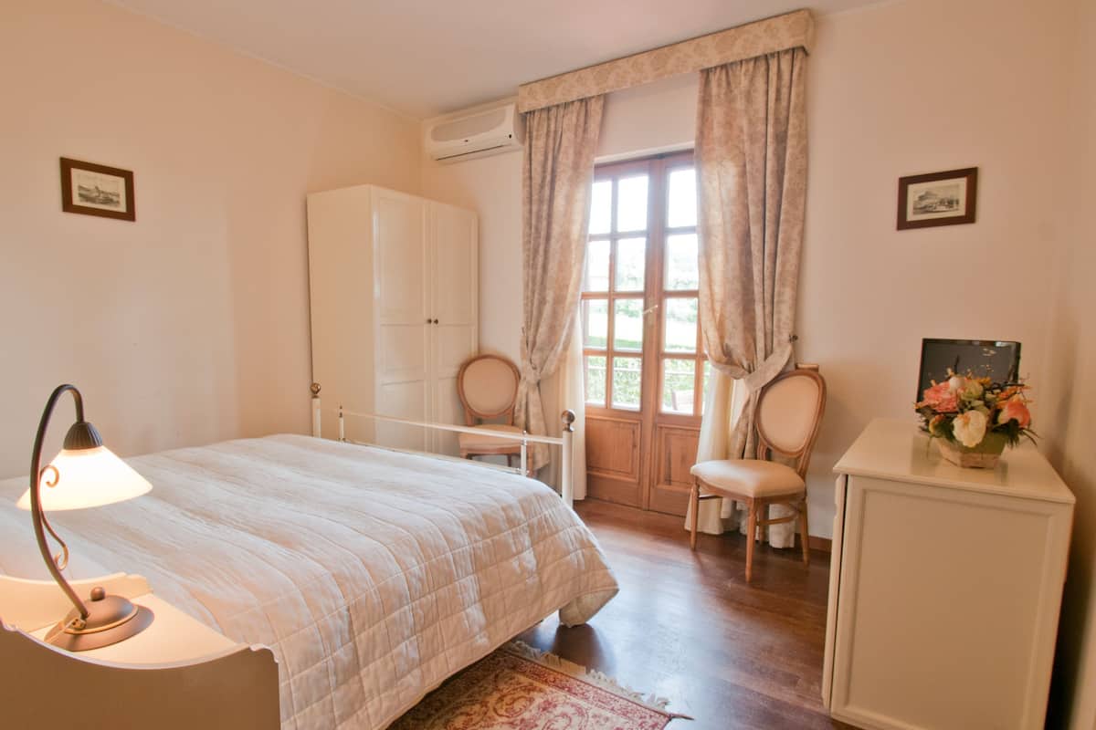 Economy Double Room, Garden View | Minibar, blackout drapes, free WiFi, bed sheets