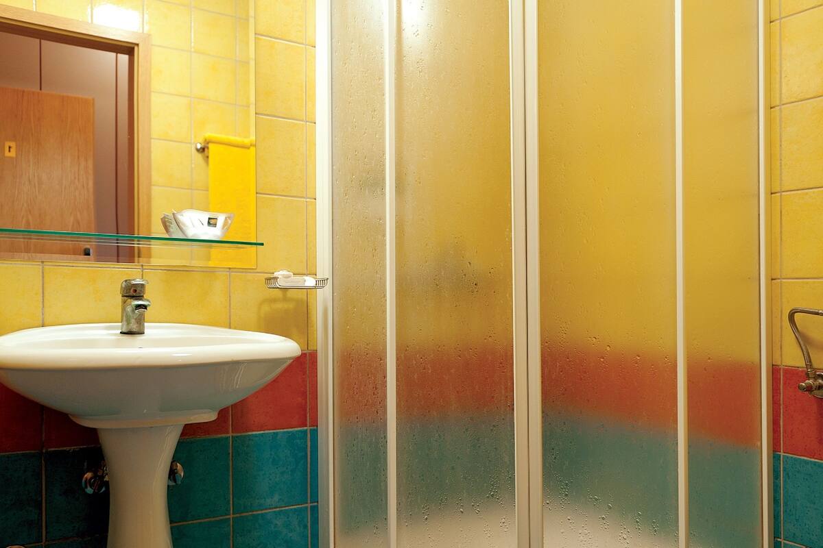 hair dryer, slippers, towels