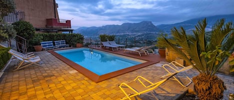 Outdoor pool, sun loungers