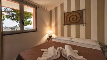 LÀgenhet Standard - 1 sovrum - eget badrum - innergÄrd | Egyptiska bomullslakan, duntÀcken, strykjÀrn/strykbrÀda och gratis wi-fi