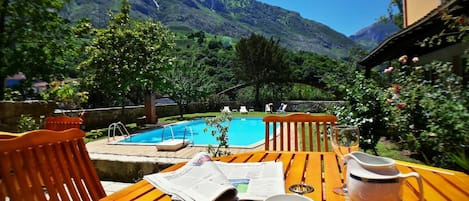 Outdoor pool, open 9 AM to 9:30 PM, sun loungers