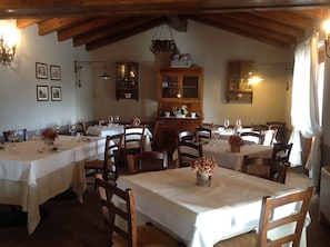 Breakfast, lunch, dinner served; local cuisine, garden views