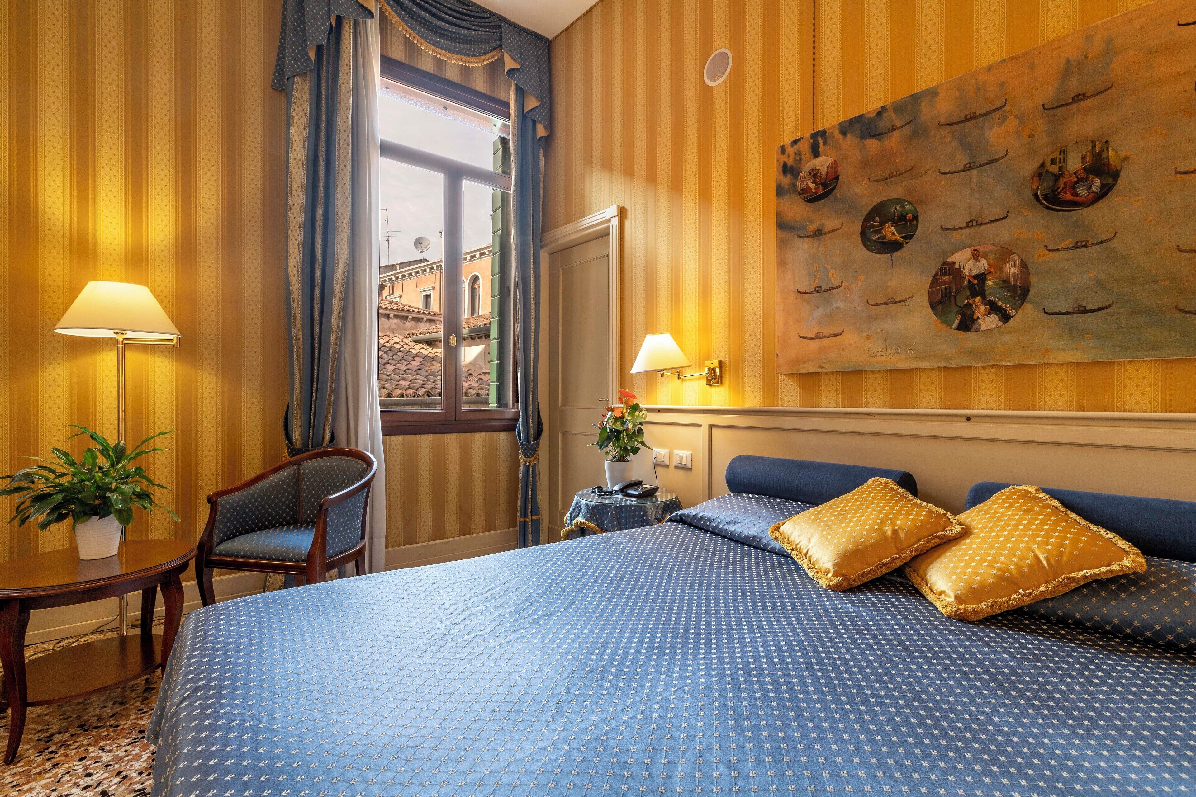 superior double or twin room | minibar, in-room safe, desk, laptop workspace