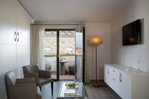 Ático panorámico (Signoria) | Zona de estar | Una televisión LCD