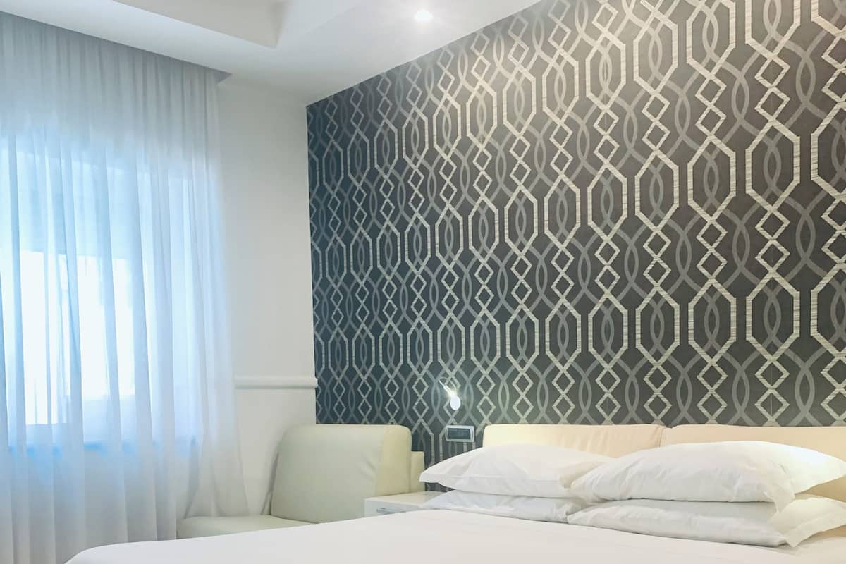 Chambre Confort, 1 grand lit et 1 canapé-lit