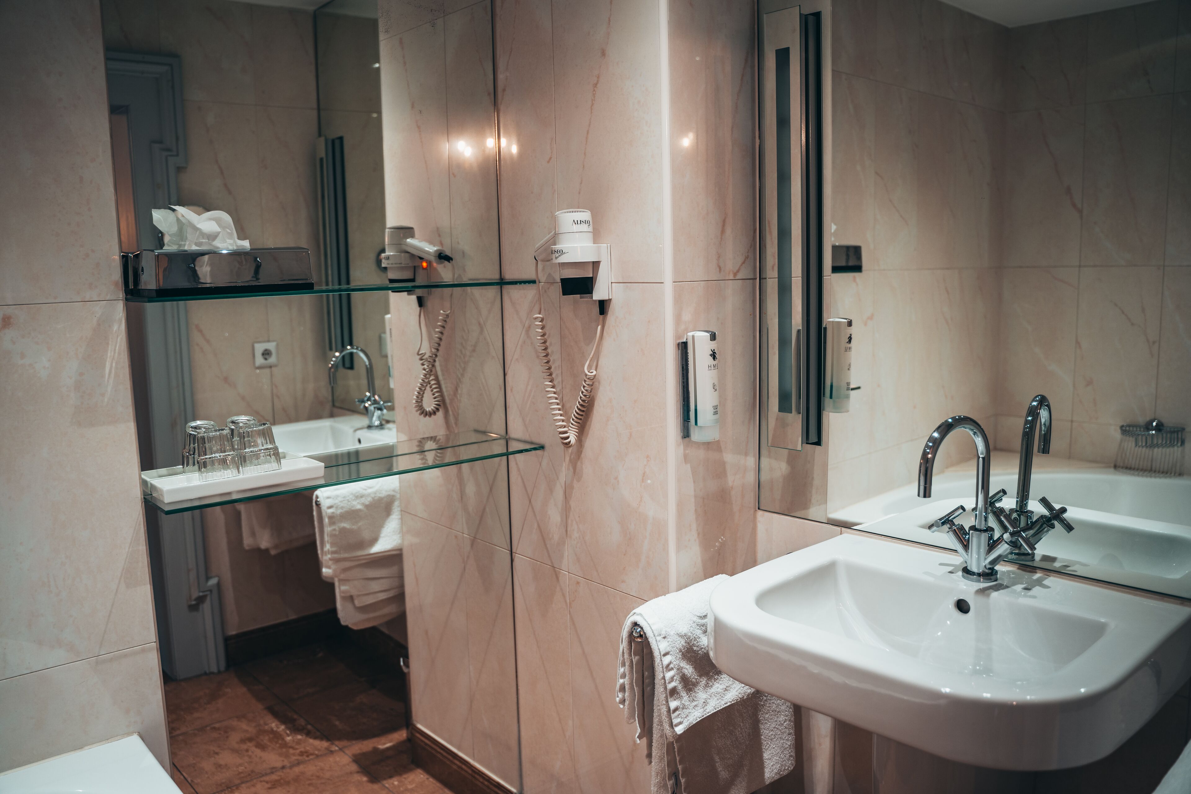 free toiletries, hair dryer, slippers, towels