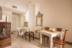 Deluxe Room, 2 Bedrooms | Living area | LED TV, pay movies - Arcom Palace (Pomezia)