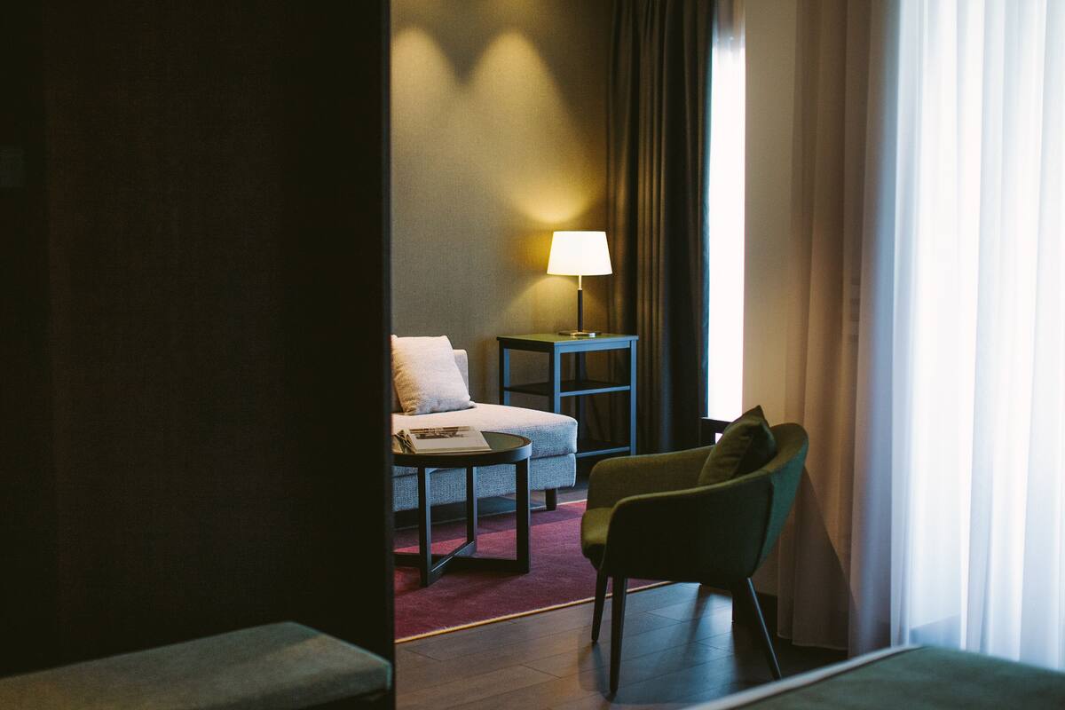 junior suite, garden view | living area | 40-inch flat-screen tv with satellite channels, tv