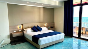 Deluxe Room | Down comforters, minibar, in-room safe, individually decorated