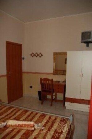 Triple Room, Private Bathroom (External) | Living area | TV - Astra (Naples)