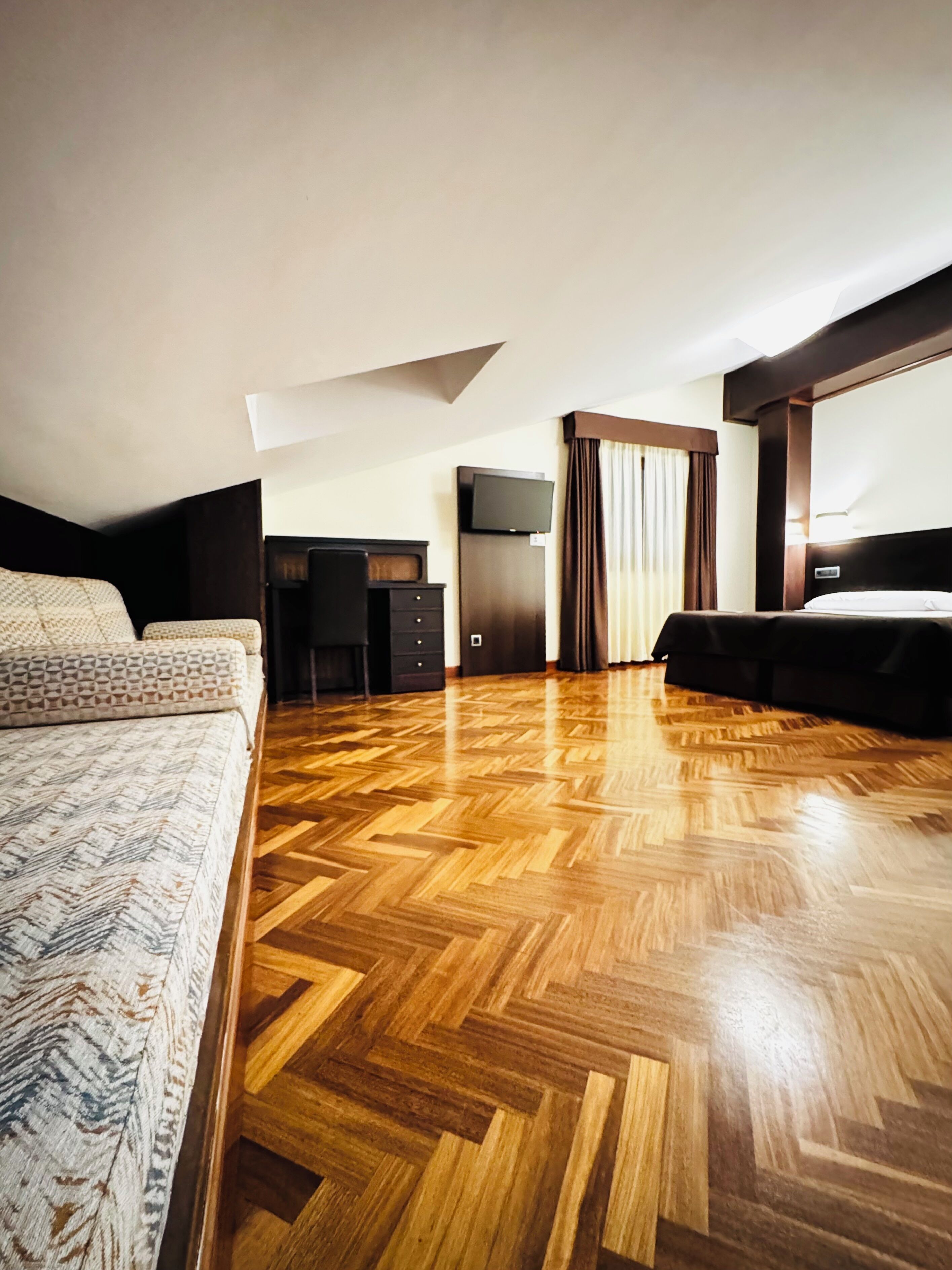 Desk, laptop workspace, blackout drapes, soundproofing