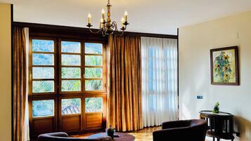 Desk, laptop workspace, blackout drapes, soundproofing