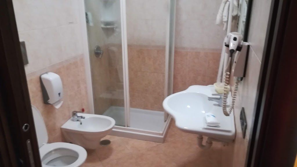 deep-soaking bathtub, free toiletries, hair dryer, bidet