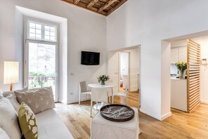 Deluxe Apartment, 2 Bedrooms, City View, Annex Building | Living area | 50-inch flat-screen TV with digital channels, TV - Trevi Beau Boutique Hotel (Rome)