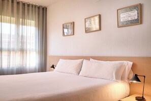 1 bedroom, desk, laptop workspace, blackout curtains