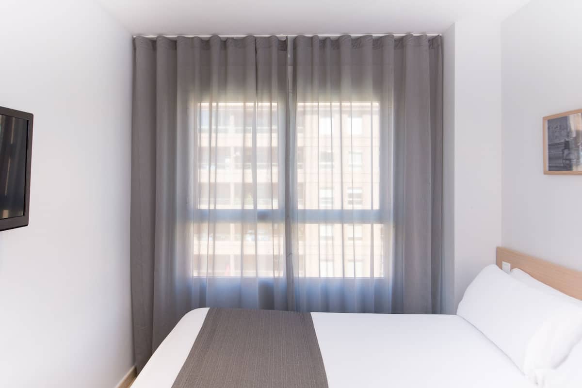 1 bedroom, desk, laptop workspace, blackout drapes