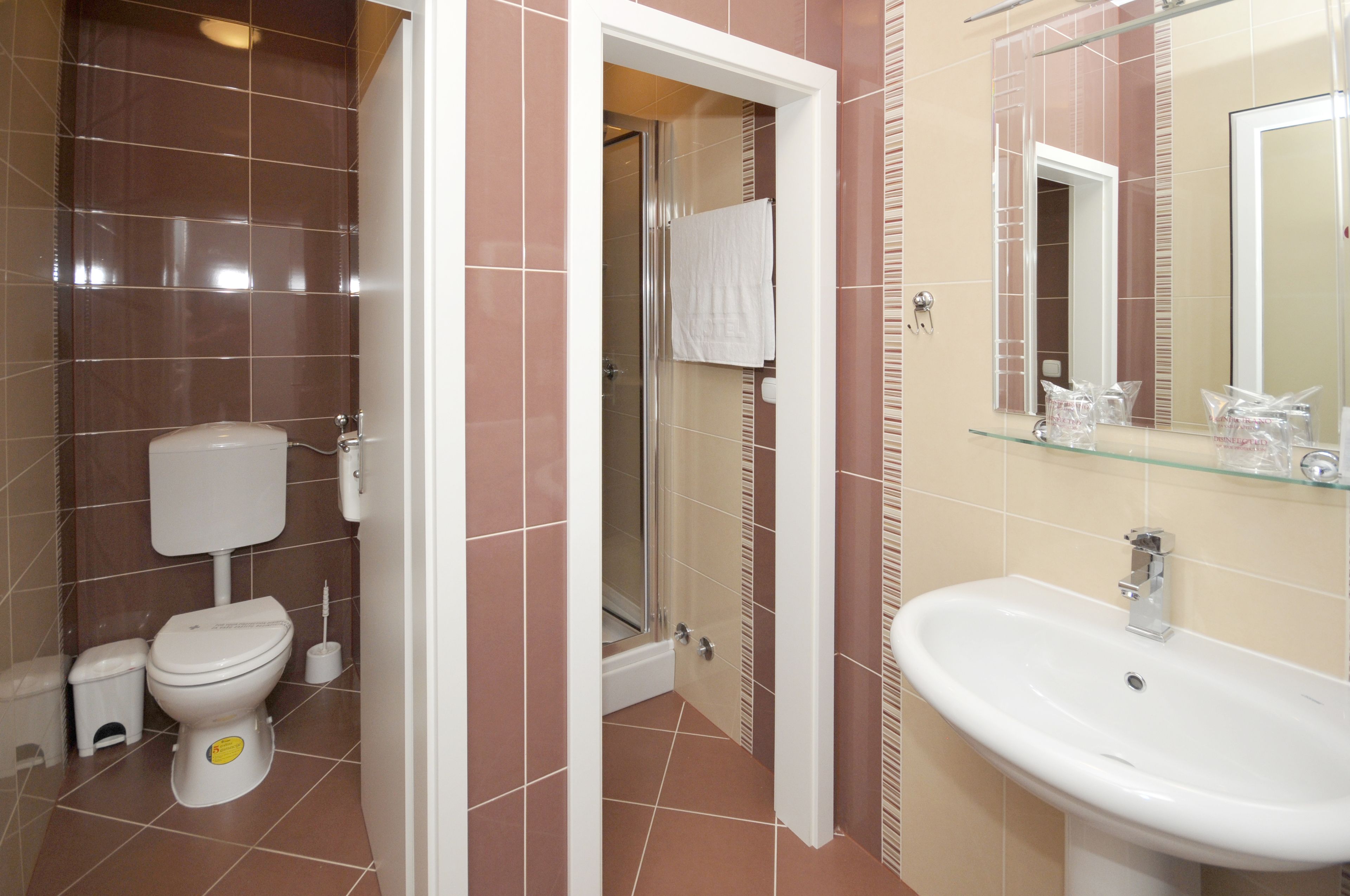 economy twin /double room | bathroom | combined shower/bathtub, hair dryer, towels, soap
