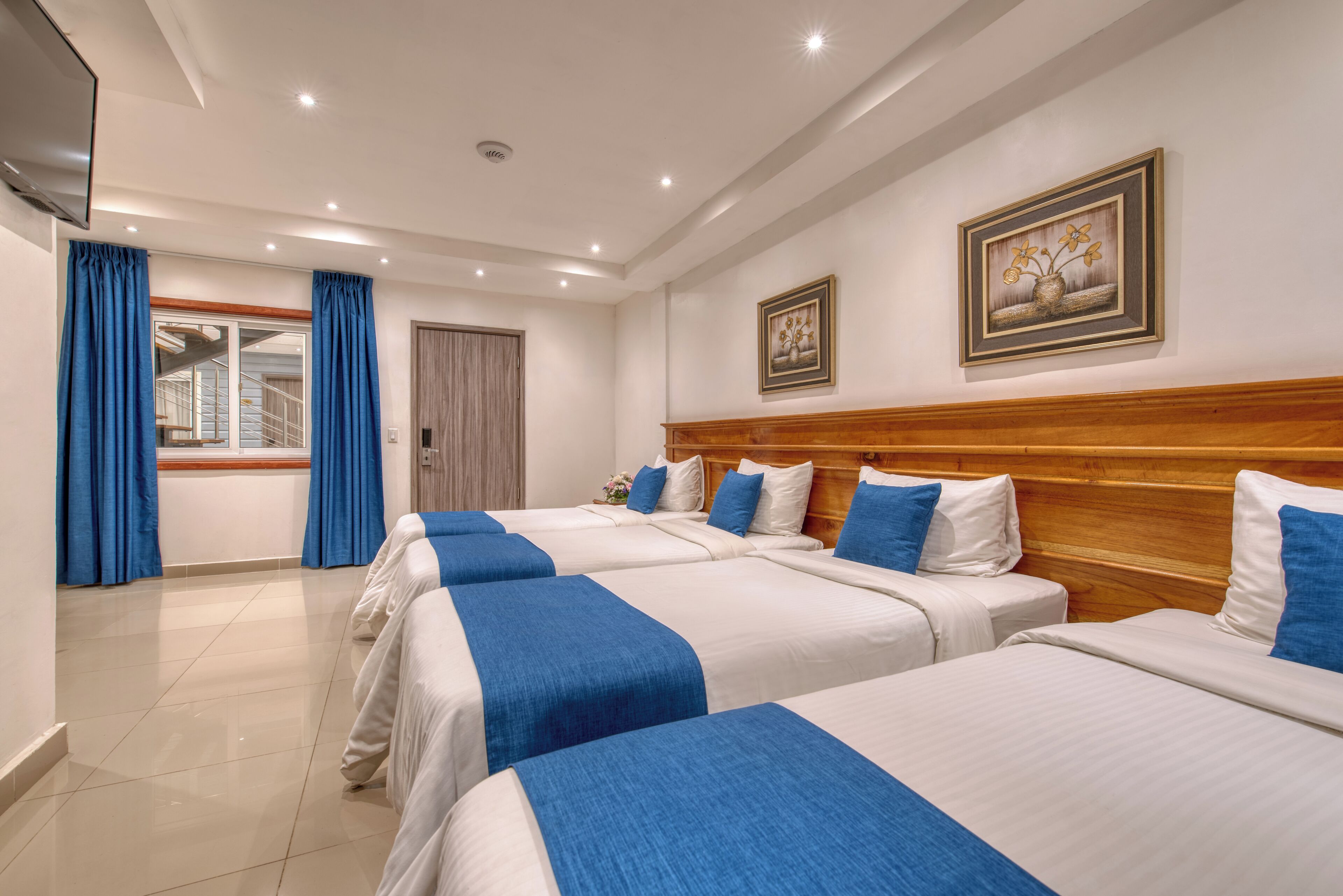 Standard Quadruple Room | Premium bedding, in-room safe, desk, laptop workspace