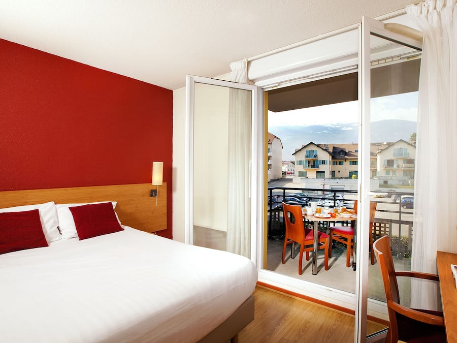 Desk, blackout curtains, free cots/infant beds, free WiFi