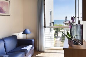 Apartment, 2 Bedrooms (Extra Large) | Living area | Flat-screen TV - Aparthotel Esperya (Lignano Sabbiadoro)