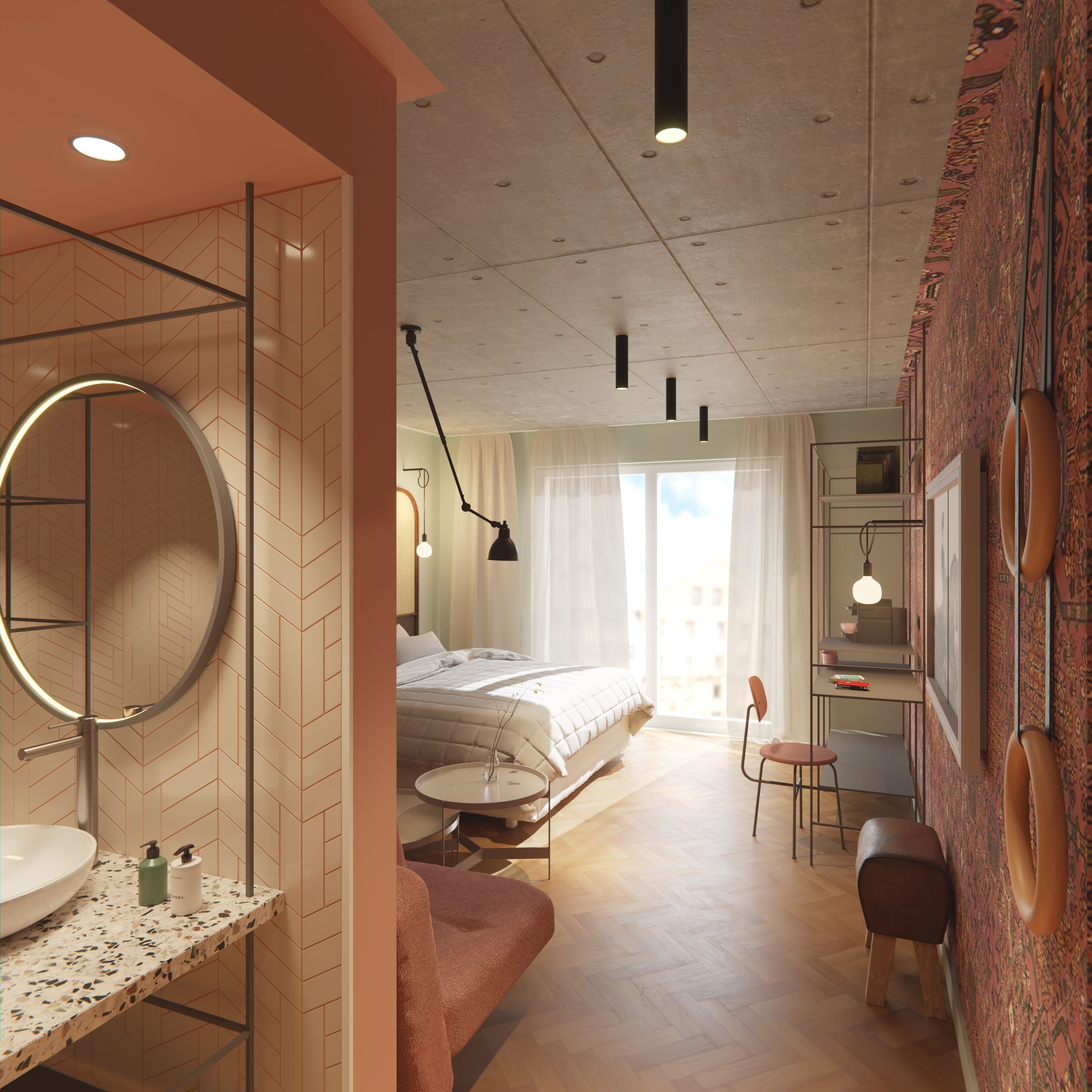 A modern hotel room with a large round mirror, a bed with a white duvet, a desk with a chair, and a view of the city through the window.
