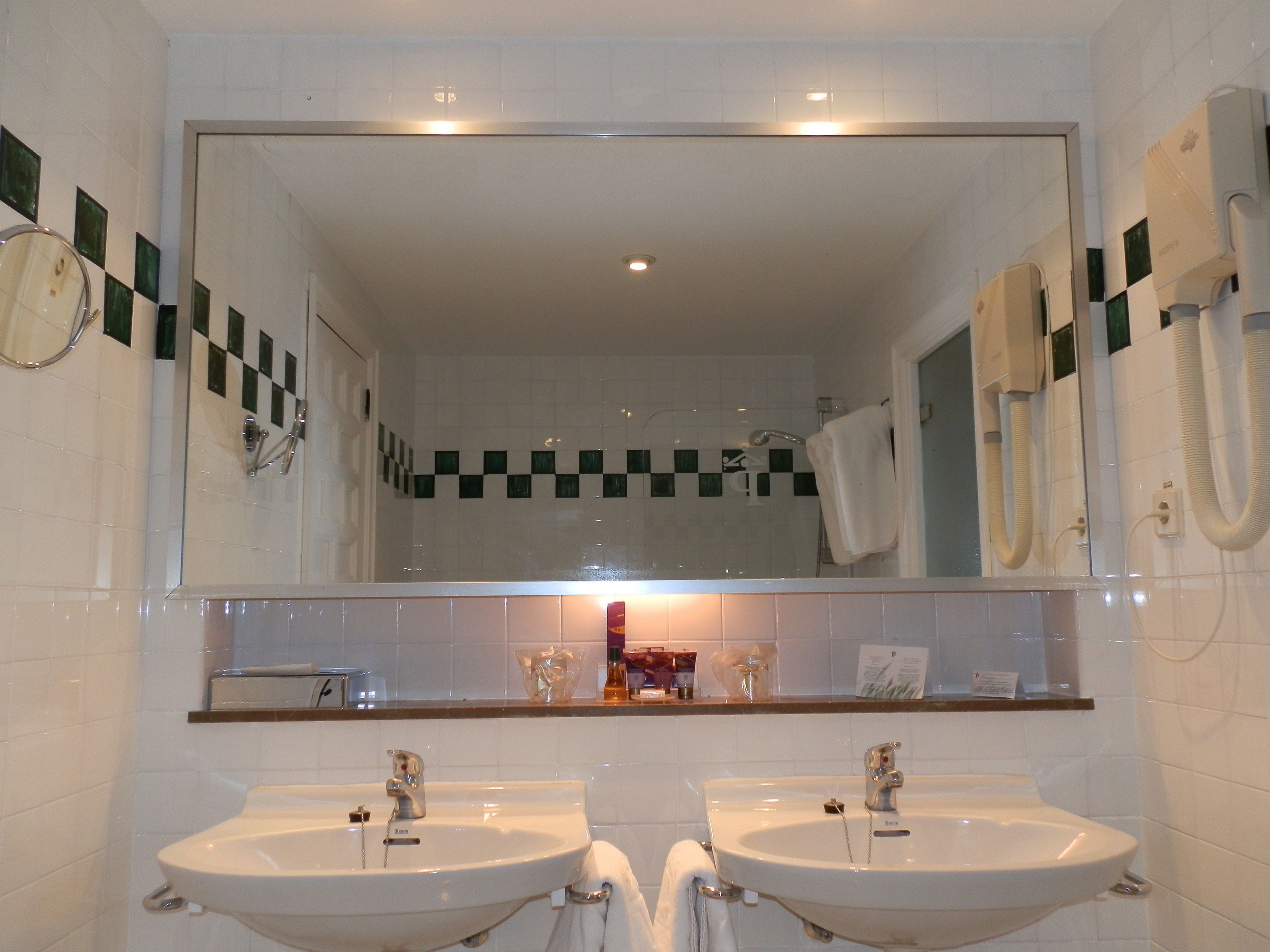 bathtub, eco-friendly toiletries, hair dryer, bidet