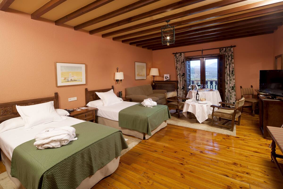 Ropa de cama de alta calidad y minibar 