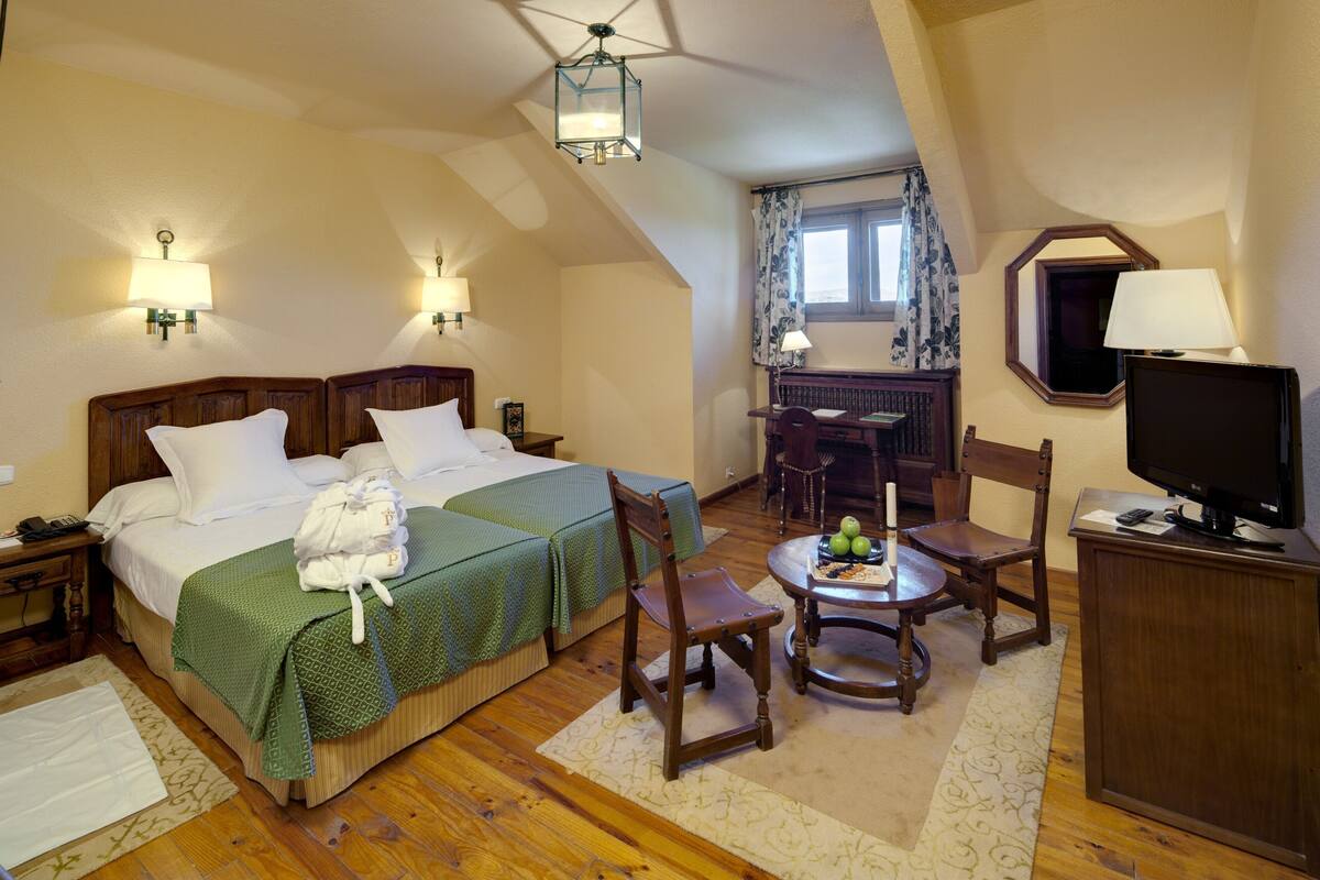 Ropa de cama de alta calidad y minibar 