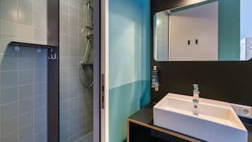 Shower, eco-friendly toiletries, towels, soap
